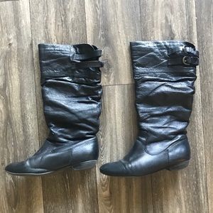 Below the knee high boots